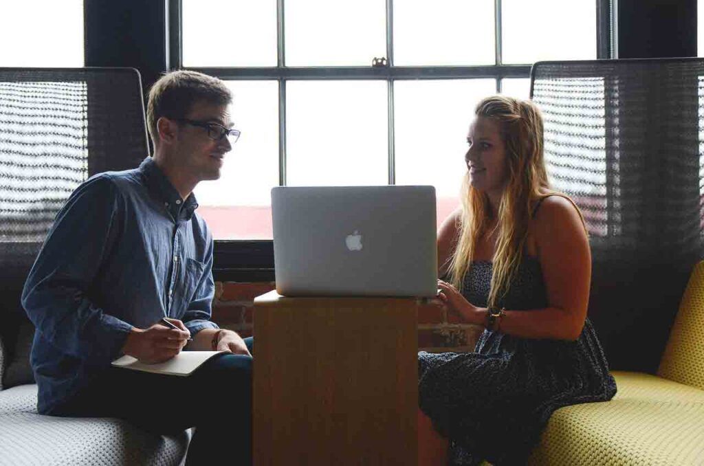 staff sat at an office desk